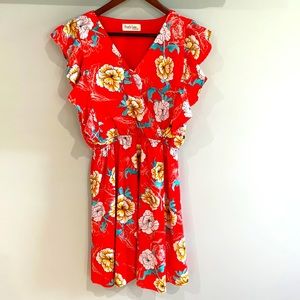 Floral dress by Peach Love in size medium.